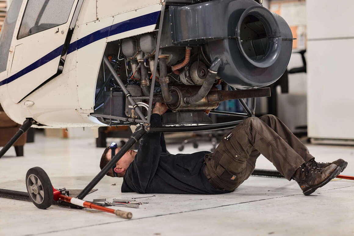 mechanic-working-on-plane-engine